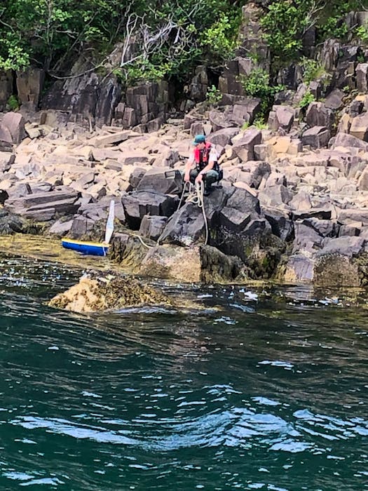 The small sailboat built by Greg Rowe’s environmental science class at Burrillville High School in Rhode Island ended up just south of the Balancing Rock on Long Island, Digby County.  