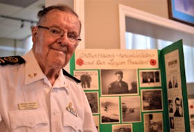 A number of Art Hiscock's Korean War photos are displayed on a board featured at a Korean War remembrance ceremony held on Wednesday, July 28 at the Summerside Legion. Hiscock is the Summerside Legion's oldest Korean War veteran. 