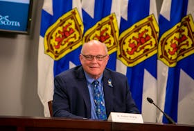 Dr. Robert Strang, Nova Scotia's chief medical officer of health, smiles during a COVID-19 news briefing Monday, July 5, 2021.