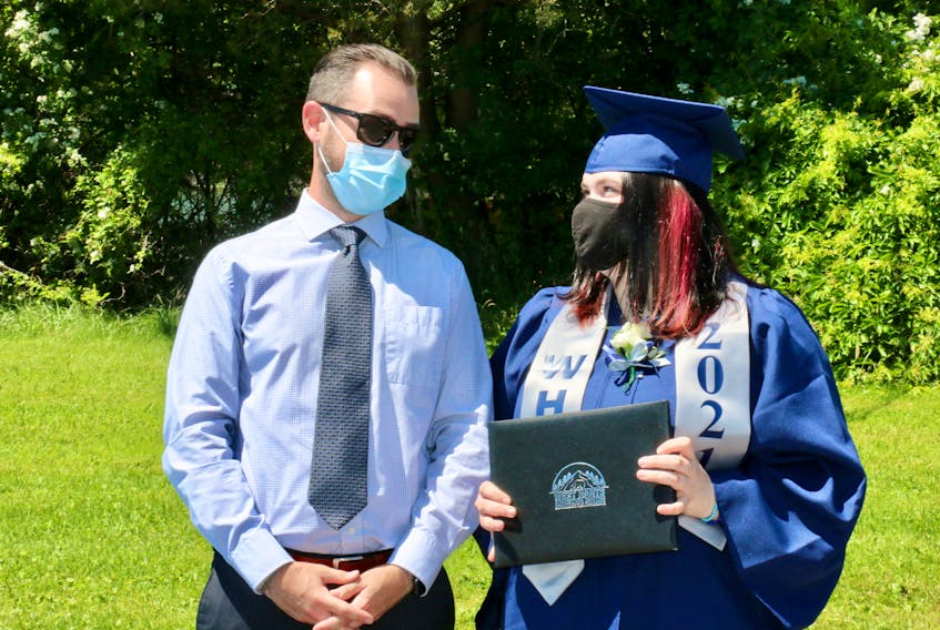 Ava Lawrence Morin teases West Hants Education Centre principal Dylan Irvine after receiving her diploma. She was one of six students to graduate in 2021 from the centre.