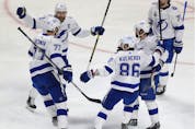Tampa Bay Lightning players celebrate with defenceman Victor Hedman after his goal during the first period of Game 3 of the Stanley Cup Final against the Canadiens in Montreal on Friday. July 2, 2021. 