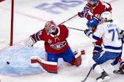 Canadiens goaltender Carey Price makes a save during Game 3 of the Stanley Cup Final against the Tampa Bay Lightning in Montreal on Friday, July 2, 2021. 