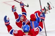 Canadiens' Josh Anderson lies on his back as he celebrates his winning goal in overtime during Game 4 of the Stanley Cup final Monday night at the Bell Centre.