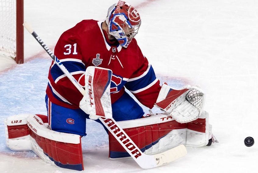 Montreal Canadiens goaltender Carey Price makes a save against the Tampa Bay Lightning  during Game 4 of the Stanley Cup final in Montreal on July 5, 2021.