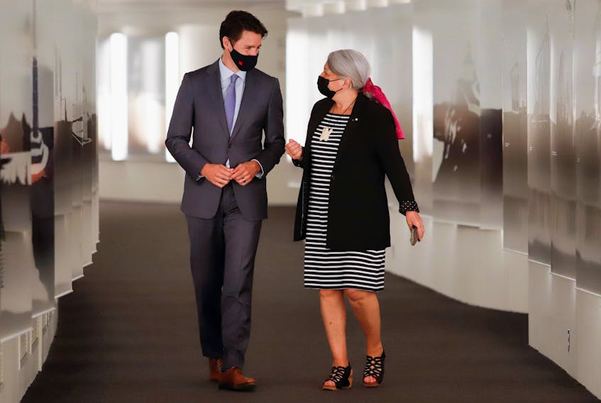 Prime Minister Justin Trudeau walks to a news conference with Mary Simon to announce her as the next Governor General of Canada in Gatineau, Quebec, Canada July 6, 2021.
