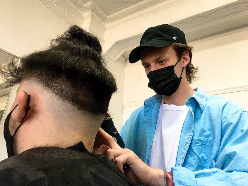 Tully Doyle gives a customer a cut at Blockhouse, where he operates as an independent business next to his cousin. - Rafe Wright/Special to the SaltWire Network