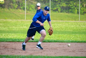 Third baseman Grant Grady charges a ground ball during the Charlottetown Gaudet’s Auto Body Islanders practice Tuesday at Memorial Field in Charlottetown.