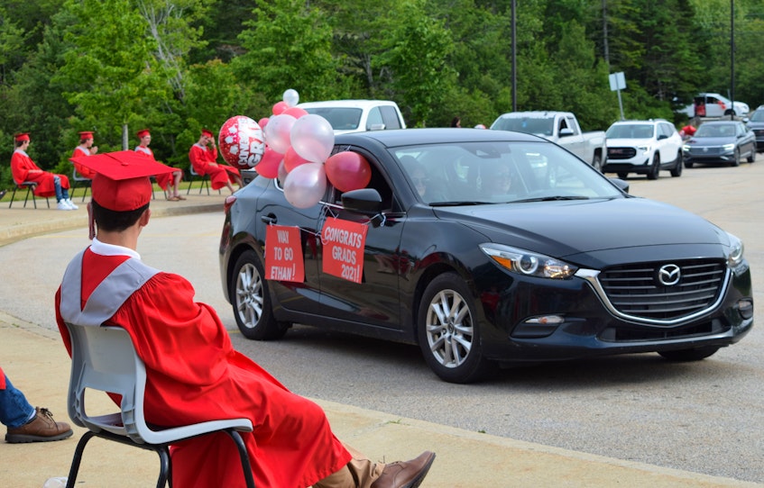 Some vehicles were decorated with balloons and signs during the community drive-by celebration parade at BMHS on June 27. KATHY JOHNSON - Kathy Johnson