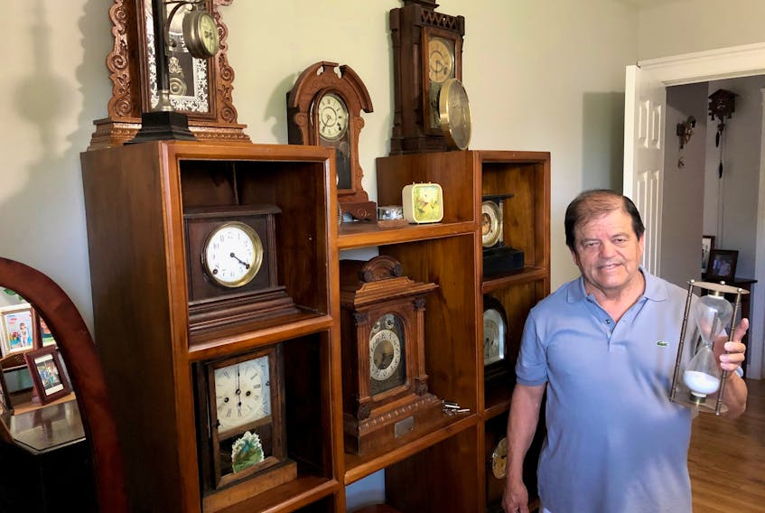Alberto Cardona, a resident of Stratford, P.E.I., shows off a small selection of his vintage clock collection, which numbers up to 150 items of virtually every era and design. Cardona purchased many of his clocks at yard sales across the Island. But while he enjoys vintage clocks in particular, Cardona also enjoys the yard sale culture, which encompasses everything from meeting old and new friends to learning about the history and background of the items on sale and the people who sell them. 