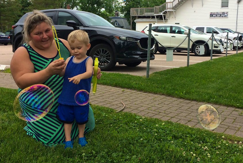 Any day is good day to stop and play with bubbles. While visiting the Sydney area, Antigonish County mom Kari Guthro and her two-year-old son Tegan, found a grassy spot to sit and let the bubbles float freely much to the squealing delight of Tegan. CAPE BRETON POST
