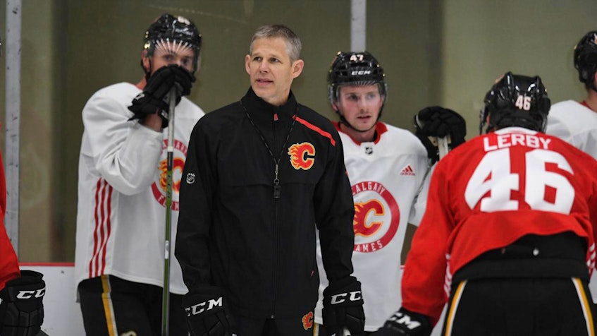 Cail MacLean leads a group of players at the 2019 Calgary Flames development camp. - Calgary  Flames