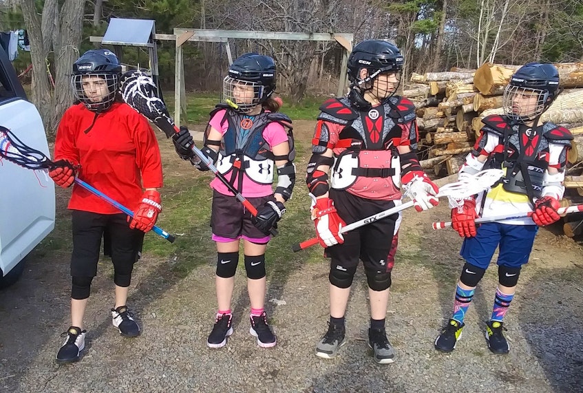 Rodney and Juanita Annis’s children in their lacrosse gear. CONTRIBUTED