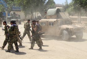 Afghan Commando forces are seen at the site of a battlefield where they clashed with the Taliban in Kunduz province, Afghanistan, June 22. With the pullout of German, Italian, British and now U.S. troops, Taliban forces are taking over more and more of the country.