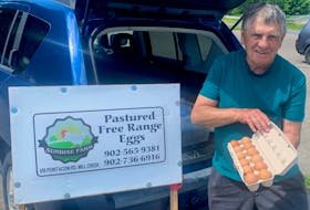 When Millcreek resident Alan Steele isn’t collecting eggs from his laying hens at Sunrise Farm, he likes to spend time on the golf course. CONTRIBUTED