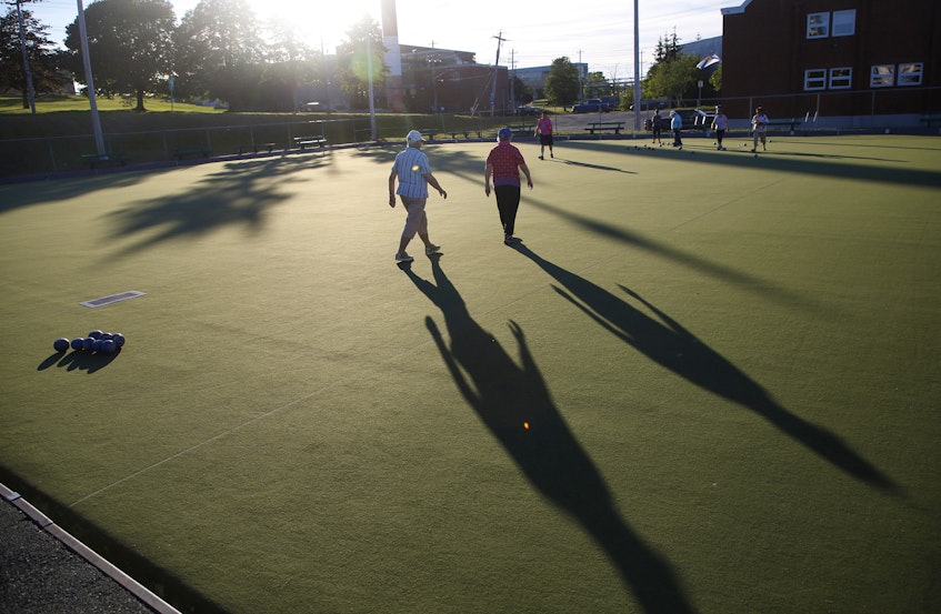 Members of the Dartmouth Lawn Bowls Club are seen during practice rounds Wednesday evening July 7, 2021. Members are very happy to be playing again, though some members are still hesitant to come back at this time. - Tim Krochak