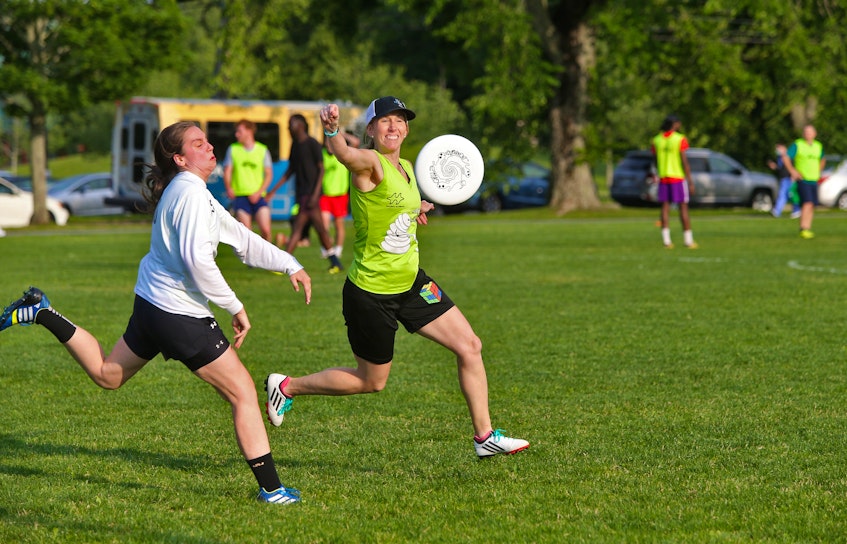 Members of Halifax Ultimate are seen during action in Halifax on Thursday evening, July 8, 2021. - Tim  Krochak