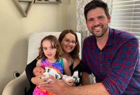 Sean Fraser and his wife Sarah Burton welcomed a new baby on July 4. The couple is pictured here with their daughter Molly holding newborn Jack.