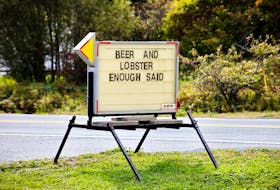 A roadside sign in Nova Scotia aptly described Atlantic Canadian appetite for local lobster and beer.