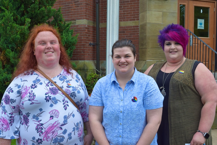 Laura Whiteland, Raelee Rath and Melissa Howell are board members of the Truro Pride Society.  - Chelsey Gould