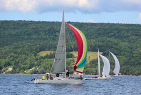 Keelboats participating the Ben Eoin Yacht Club and Marina’s annual East Bay Regatta took full advantage of the favourable wind after changing heading and making their way back toward the marina. Above, the crew of Just in Time check out the billowed spinnaker as they swiftly sailed across the Bras d’Or Lake in Sunday’s race that was sponsored by the The Lakes Resort and Golf Club. The three-day regatta began Friday and wrapped up Sunday. DAVID JALA/CAPE BRETON POST