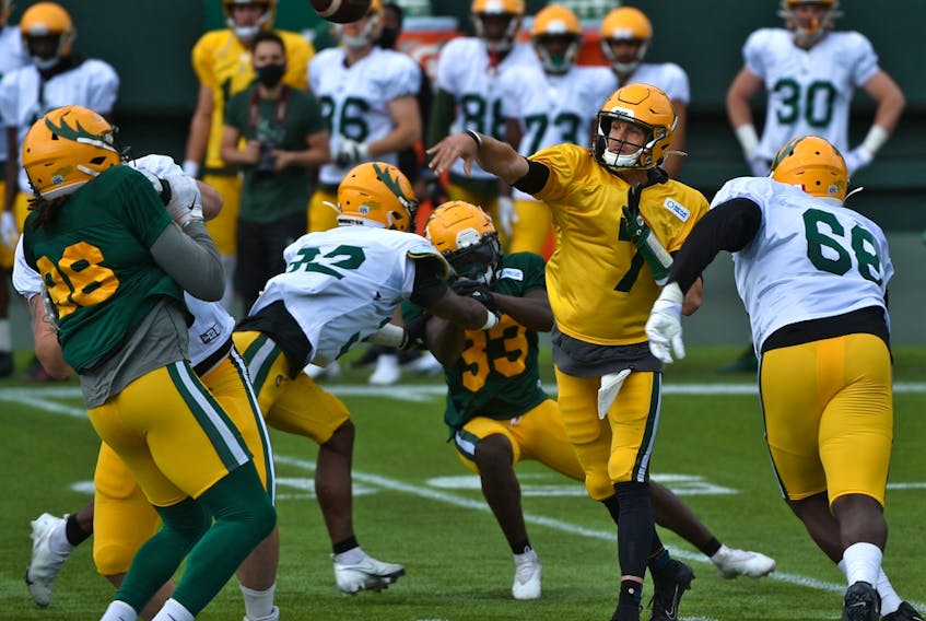  Edmonton Elks quarterback Trevor Harris throws a pass during the team’s lone scrimmage of training camp at Commonwealth Stadium in Edmonton on Sunday, July 25, 2021.
