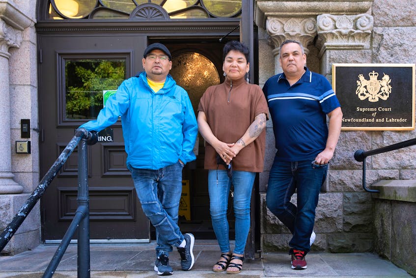 The Innu Nation filed a lawsuit on Aug. 10 against the provincial and federal governments regarding the proposed Muskrat Falls rate-mitigation deal. Shown (rom left) are Innu Nation Grand Chief Etienne Rich, Innu Nation Deputy Grand Chief Mary Ann Nui and Chief Eugene Hart of the Sheshatshiu Innu First Nation. — Photo by Greg Locke
