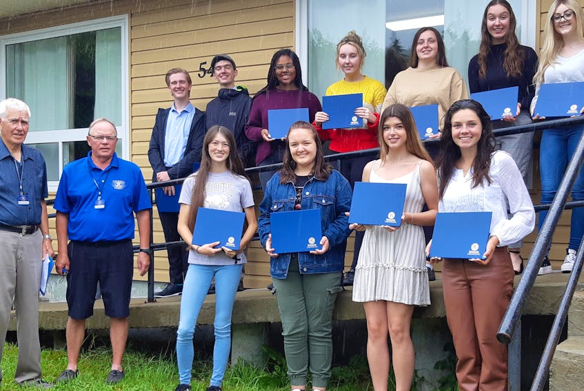 The Kiwanis of Cape Breton Golden K Club recently awarded bursaries of $1,000 each, to graduates of four local high schools, Riverview High in Coxheath, Sydney Academy, Breton Education Centre in New Waterford and Glace Bay High. Shown here are several of the 16 recipients who were honoured this year. From left, front row, Don Matheson chair of the bursary committee; club president John Ryan; Amaya Fuller (RH); Leah MacSween (RH); Meghan MacIntyre (GB) and Janelle Tierney (RH); back row, Jack Gillespie (RH); Rory Morrison (RH); Jaiden Kariuki-MacDonald (SA); Kendra MacKinnon (BEC); Brianna Budden (GB); Laura Colford (RH) and Samantha Griffen (BEC). Absent when photo was taken was Lauren H. Campbell (BEC). CONTRIBUTED