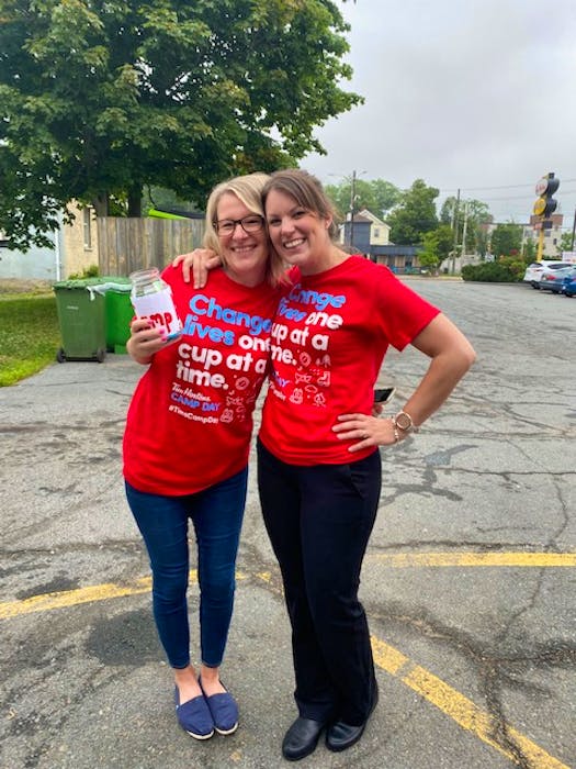 Hants West PC candidate Melissa Sheehy-Richard and Ashley Wood, the franchise owner of Windsor’s Tim Hortons locations, worked hard July 21 to raise funds for Camp Day. - Contributed