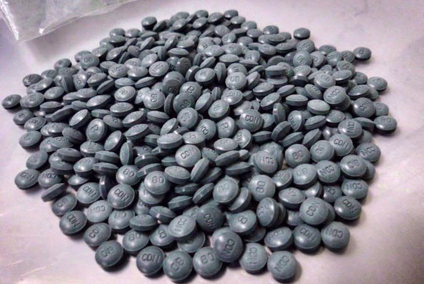 Fentanyl pills are shown in an undated police handout photo.