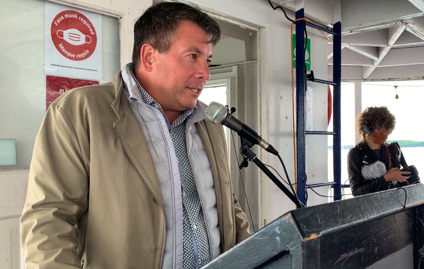 Aug. 12, 2021 - Dennis Campbell, CEO of Abassatours Gray Line and Murphy's Cable Wharf, speaks to a group gathered for a boat tour to oppose a private landowner's plan to infill part of the Northwest Arm. - Stuart Peddle