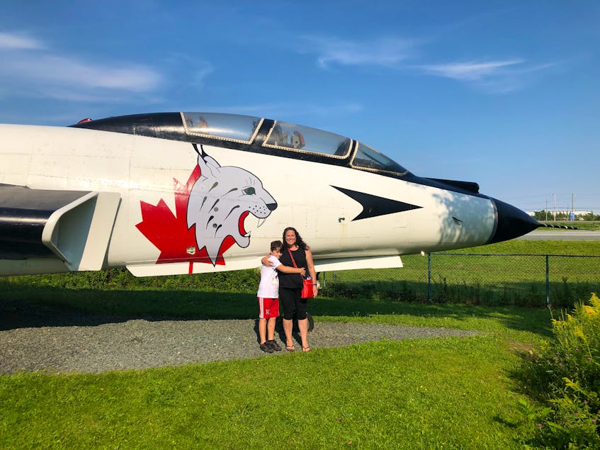 Many people drive by the iconic CF 101 Voodoo on Highway 102 near the Halifax airport without realizing the museum is there, says Helen Earley, pictured with her son, seven-year-old Michael Barker.  - Helen Earley