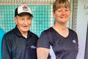 Walter Gretzky with June Dobson. A charge against Dobson, 58, a commanding officer at the Ontario Provincial Police (OPP) detachment in Grenville, over the sale of a hockey stick reported to be used by Wayne Gretzky, was withdrawn, according to her lawyer.