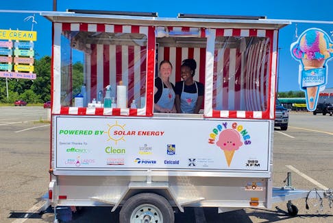 Antigonish high school student Nicky Nicholson, left, with friend and co-worker Chelsea Taiwo, has opened her first business at the age of 15. Happy Cones is a solar-powered ice cream trailer that serves the tasty treat as well as knowledge on clean energy and climate change at different locations across town.