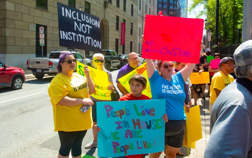People attend a Disability Rights Coalition rally outside Province House on Friday, Aug. 13, 2021. - Ryan Taplin
