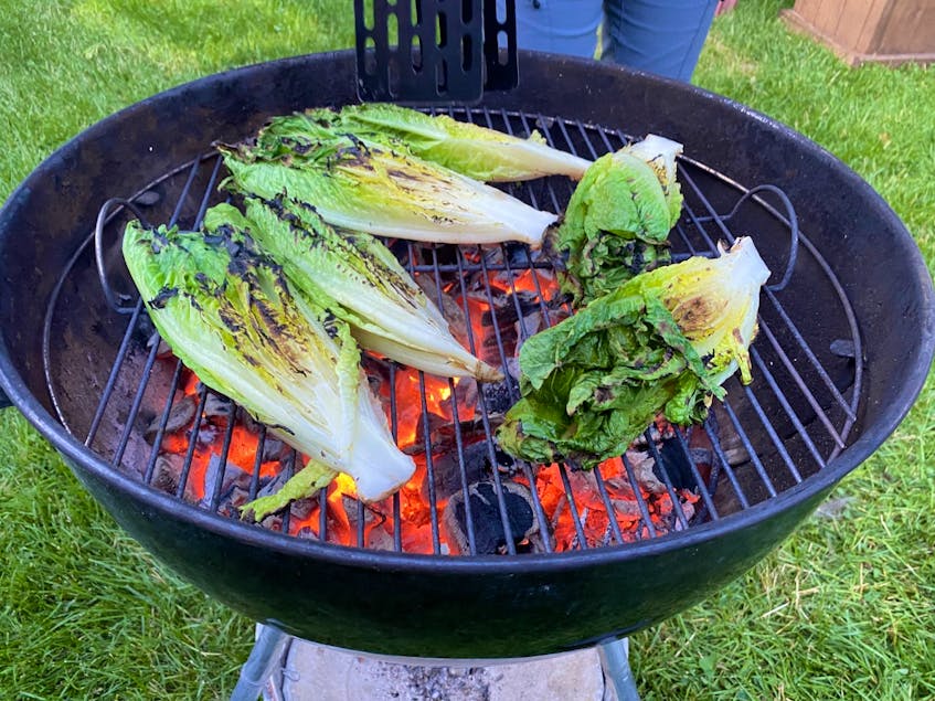 Cooking romaine hearts on the grill provides a smoky flavour and tender texture.  - Erin Sulley