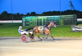 Jason Hughes drives Rock Lights to victory in the preferred class at Red Shores Racetrack and Casino recently. The time of the mile was 1:52.2. Rock Lights will leave from the rail in The Guardian Gold Cup and Saucer Trial 2 at the capital city oval on Aug. 14. Gail MacDonald Photo