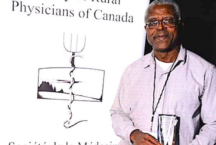 Dr. Kweku Dankwa shows off his Society of Rural Physicians of Canada’s Lifetime Membership Award in this 2018 file photo.