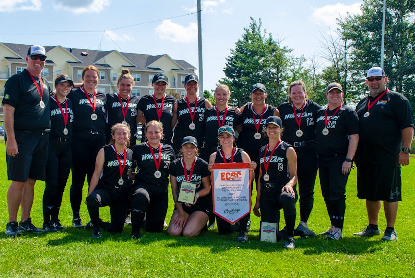 The P.E.I. Whitecaps rallied in the bottom of the seventh inning to defeat the Nova Scotia She Devils 9-8 in the gold-medal game of the Eastern Canadian women’s intermediate fastpitch championship at Central Field in Charlottetown on Aug. 15. Members of the Whitecaps are, front row, from left: Haley Savidant, Hannah Sentner, Kailey Koughan, Emily Cairns and Kate Domarchuk. Back row: Chris Halliwell (head coach), Kaelyn White, Sydney Halliwell, Jada Yeo, Madison Clarke, Charley MacIntyre, Brianna Arsenault, Natasha MacDonald, Katie Rayner, Genna Phelan and David Rupert (assistant coach).