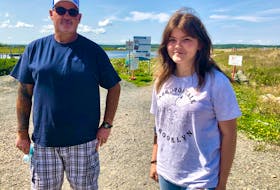 Mackenna Donovan, 16, is grateful Nova Scotia Provincial Parks employee Blaine Cathcart spotted her necklace and locket at the start of the pathway to Dominion Beach. NICOLE SULLIVAN/CAPE BRETON POST 