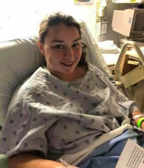 Taylor Boudreau-Deveaux is seen recovering in hospital after an apparent shark attack. Contributed - Christopher Connors