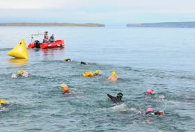 And they’re off. Swimmers begin their Try The Tickle swim after leaving the shoreline at Topsail Beach on Saturday morning.
-Joe Gibbons/The Telegram
