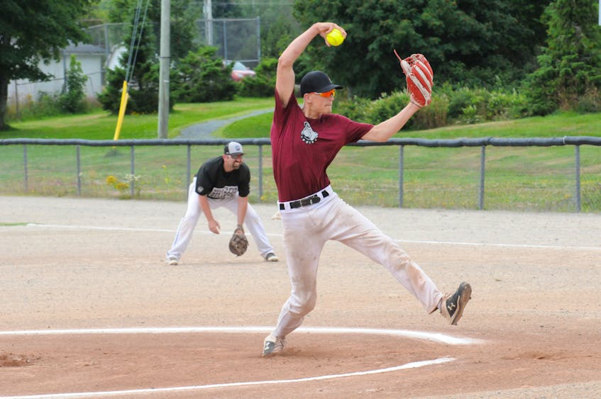  Kelly’s Pub Molson Bulldogs pitcher Nick Woodford delivers a pitch Sunday — Joe Gibbons/The Telegram