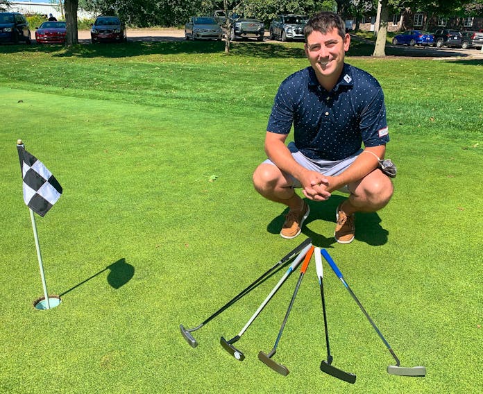 Stuart Cox of Truro with a few of the custom putters he designs and builds.