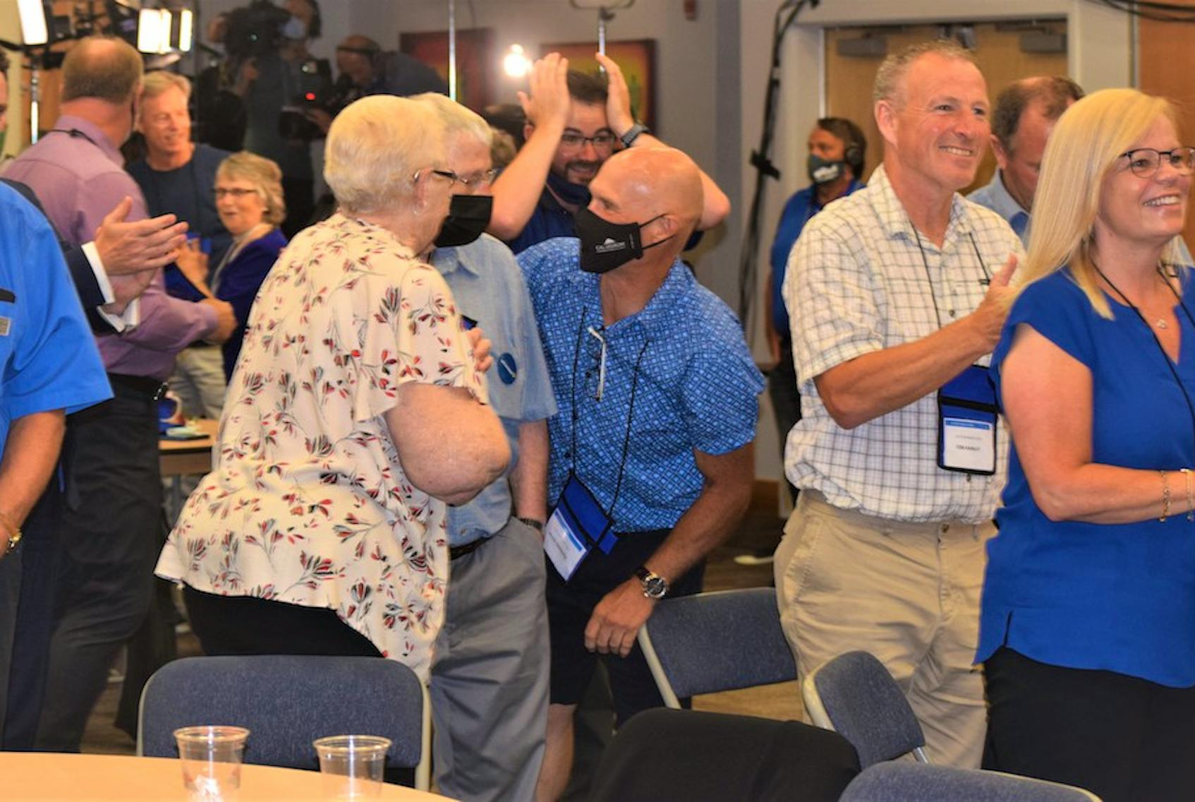 Supporters at the Tim Houston election night headquarters, at the Pictou County Wellness Centre in Westville, react to the news the Progressive Conservatives were the projected winner of the 2021 Nova Scotian election, and Houston the province's next premier on Tuesday, Aug. 17, 2021. - Richard MacKenzie