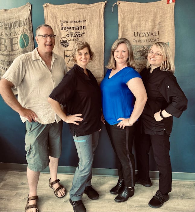 Petite Patrie Chocolate co-owners Peter Austin-Smith and Gabrielle Breault, Leann Grosvold (operations and sales manager), and Janine Radul (general production manager) are passionate about offering fair trade, sustainable, from bean-to-bar chocolate.  - Contributed