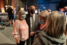 Nova Scotia NDP leader Gary Burrill and his wife Debbie Perrott greet supporters at his post-election rally at Alderney Landing on Tuesday night.