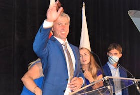 Progressive Conservative Leader Tim Houston celebrates with his family and supporters at the Wellness Centre in Pictou County after his party rocketed to an upset majority government Tuesday, Aug. 17, 2021.