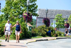 People enjoy the sights as they stroll along historic Dock Street in Shelburne. KATHY JOHNSON • TRICOUNTY VANGUARD