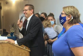 Progressive Conservative candidate Chris Palmer speaks to his supporters at the Aylesford & District Lions Club while surrounded by his family after winning Kings West Aug. 17.