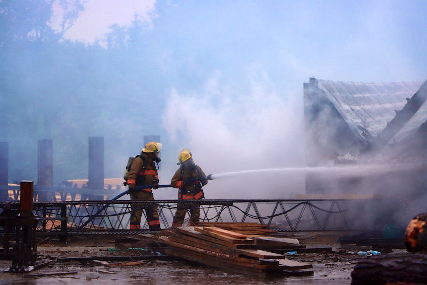 Fire departments from at least three counties are helping to tackle the lumber mill fire. - Contributed